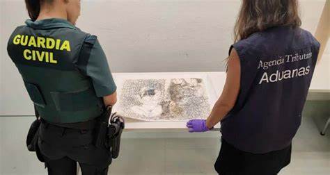 Personal de la Guardia Civil y la Agencia Tributaria española confiscaron el dibujo de Picasso. Foto: AFP.