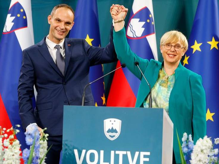 La primera presidenta de Eslovenia, Natasa Pirc Musar, junto a Anze Logar. Foto: AP.